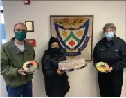  ?? SUBMITTED PHOTO ?? Snacks were delivered to VMSC on February 23. Pictured are paramedic Diane Morrissey with Barbara Thompson and Paul Bisio.