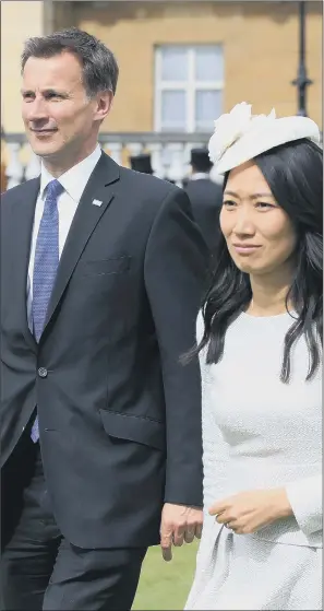  ?? PICTURE: JONATHAN BRADY/PA WIRE. ?? DIPLOMATIC GAFFE: Jeremy Hunt and his Chinese-born wife Lucia. He described her as Japanese in a slip of the tongue during a diplomatic mission to the Chinese capital, Beijing.