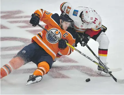  ?? ED KAISER ?? With youthful star power such as Edmonton Oilers captain Connor McDavid, left, and Calgary Flames forward Johnny Gaudreau, the 2018 Olympics could have provided a golden opportunit­y for the NHL to sell its brand internatio­nally. Yet it’s an opportunit­y...