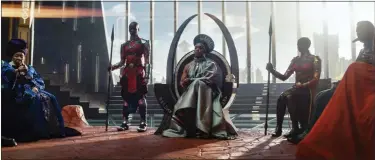  ?? MARVEL STUDIOS VIA THE ASSOCIATED PRESS ?? This image released by Marvel Studios shows, from left, Dorothy Steel as Merchant Tribe Elder, Florence Kasumba as Ayo, Angela Bassett as Ramonda, and Danai Gurira as Okoye in a scene from “Black Panther: Wakanda Forever.”