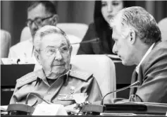  ??  ?? Castro (left) talks with Diaz-Canel during the year-end parliament­ary session at the Convention Palace in Havana. — AFP photo