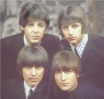  ?? ROBERT FREEMAN, COPYRIGHT APPLE CORPS LTD./AP ?? The Beatles on an album cover photo by Robert Freeman in 1965.