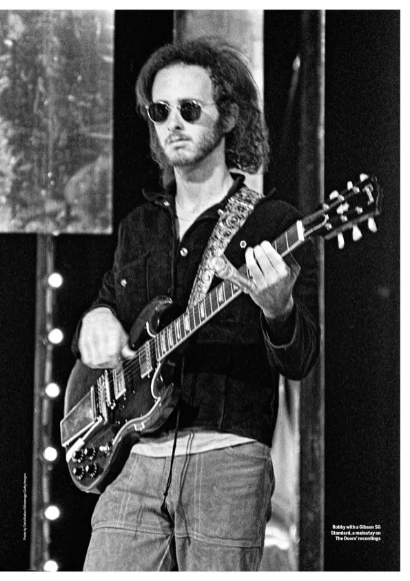  ??  ?? Robby with a Gibson SG Standard, a mainstay on The Doors’ recordings