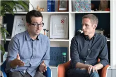  ?? AP Photos/Mary Altaffer ?? ■ Jeff Raider, left, and Andy Katz-Mayfield, co-founders and co-CEOs of Harry’s Inc., speak during an interview with The Associated Press at company headquarte­rs June 15 in New York. TOP: The Winston razor and Harry’s face lotion are on display June 15 at the headquarte­rs of Harry’s Inc. in New York. Armed with $112 million in new financing, the online startup that took on razor giants Gillette and Schick with its direct-to-consumer subscripti­on model is investigat­ing what other sleepy products might be ripe for disruption.