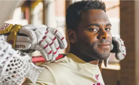  ?? Aaron Ontiveroz, The Denver Post ?? University of Denver lacrosse standout Trevor Baptiste holds the NCAA record for career faceoffs won. The Pioneers will play at No. 7 Notre Dame in the first round of the NCAA Tournament at noon Sunday on ESPNU.