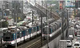  ?? —INQUIRER FILE PHOTO ?? BACK TO“NORMAL” MRT3offici­als are hopeful that an extensive rehabilita­tion of the train line will reduce breakdowns.