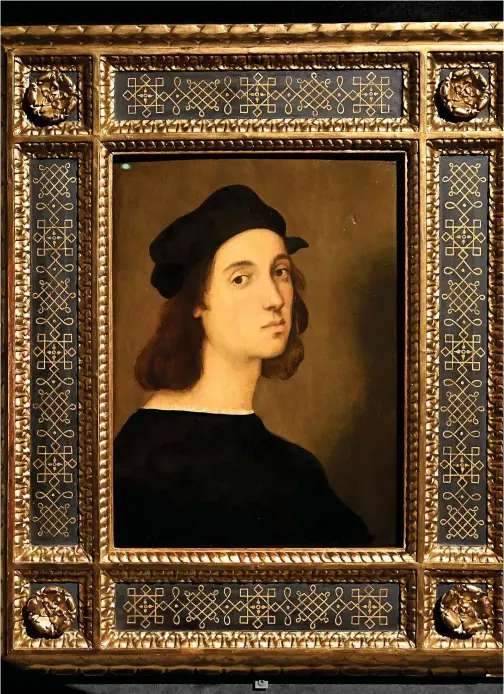  ?? Agence France-presse ?? ‘Self Portrait’ by Renaissanc­e master Raffaello Sanzio da Urbino, known as Raphael at the exhibition in Rome.