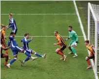  ??  ?? LEE-WAY Gillingham’s Oliver Lee scores against Hull HULL:
MAN OF THE MATCH: Tigers’ good moments. REFEREE: Martin Coy 7.