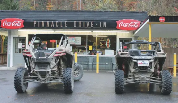  ??  ?? UTVS are welcome in towns along the
Hatfield-mccoy Trails, making for
plenty of muddy lunch runs.