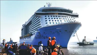  ?? XINHUA ?? A cruise ship docks in Zhoushan Port, Zhejiang province, for repairs.