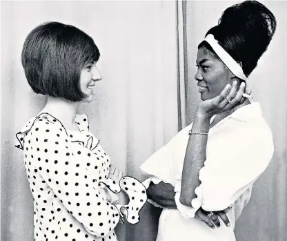  ??  ?? Cilla Black, left, and Dionne Warwick. The Sixties feud between the pair over the song ‘Anyone Who Had A Heart’ forms a basis for Warwick’s new film