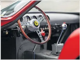  ??  ?? CUTTING A DASH Elegant leather, wood and chrome interior of Ferrari