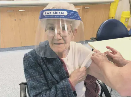  ??  ?? 100-year-old Nancy received her second vaccine on January 6.