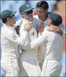  ?? REUTERS ?? Olivier (2nd from right) celebrates dismissing Imam-ul-haq.