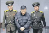 ??  ?? Canadian pastor Hyeon Soo Lim is escorted to his sentencing in Pyongyang, North Korea, in 2015. The Canadian pastor serving a life sentence in North Korea has been allowed to meet with the Swedish ambassador in Pyongyang and telephone his family.