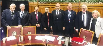  ??  ?? Lord Maginnis, far left, and Baroness Hussein-Ece, fourth from left, were among a group of British peers who met then TRNC PM Ersin Tatar, centre, in the UK Parliament