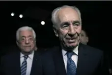  ?? NASSER NASSER/THE ASSOCIATED PRESS FILE PHOTO ?? While many politician­s expressed their condolence­s after Shimon Peres’s passing, some across the Arab world recalled him in much harsher terms.