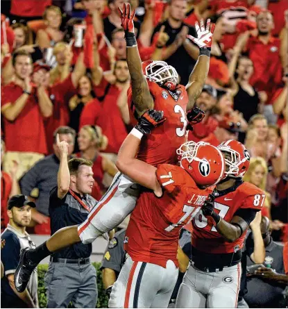  ?? AJC 2014 ?? Todd Gurley (3) says friends from his days at UGA are as excited as he is to see him come to Atlanta to play for the Falcons. The All-Pro RB says he believes he has plenty left in the tank, and he wanted to join the Falcons now “to be able to create my legacy.”