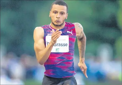  ?? THE CANADIAN PRESS/DARRYL DYCK ?? Canada’s Andre De Grasse, of Markham, Ont., races to a first place finish in a time of 10.17 seconds during the 100-metre race at the Harry Jerome Internatio­nal Track Classic in Coquitlam, B.C., on Wednesday, June 28, 2017. De Grasse will miss the...