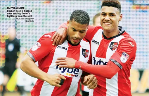  ?? PICTURES: ProSports/ Nigel Cole ?? MATCH-WINNER: Reuben Reid is hugged after sealing Exeter’s fightback from the spot