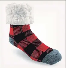  ?? PUDUS THE WASHINGTON POST ?? Red lumberjack slipper socks.