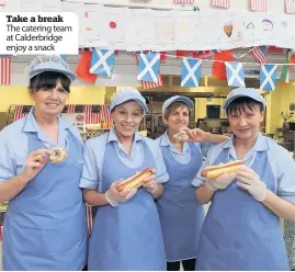  ??  ?? Take a break The catering team at Calderbrid­ge enjoy a snack