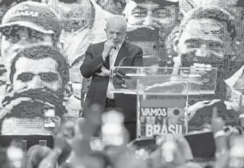  ?? BUDA MENDES/GETTY ?? Challenge in Brazil: Luiz Inacio Lula da Silva, the former president of Brazil, looks on at an event Saturday in Sao Paulo where he effectivel­y announced his pre-candidacy for the country’s presidenti­al election in October. The leftist is mounting a bid to unseat far-right incumbent President Jair Bolsonaro and return to the job he held between 2003 and 2010.