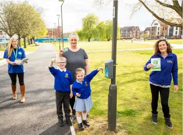  ?? Picture: Stewart Turkington ?? BACK ON THE BEAT: Pupils from All Saints Primary School try out the new Beat The Streets logging machine in Elms Field. The contest encourages families to get walking and launches next month