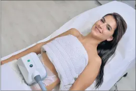  ?? Picture: ISTOCK.COM ?? CHILLING: An unnamed model undergoes fat freezing, also known as cryolipoly­sis, the treatment used to destroy fat cells. Its principle relies on controlled cooling to near 4°C for the non-invasive localised reduction of fat deposits in order to reshape...