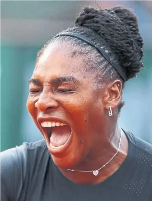  ?? CAMERON SPENCER/GETTY IMAGES ?? Serena Williams, ranked 451st after a long layoff, advanced to the third round of the French Open.