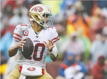  ?? ROB CARR/GETTY IMAGES ?? Jimmy Garoppolo has thrown six intercepti­ons against seven touchdowns, but the only number that counts to his teammates in San Francisco is the 49ers are 6-0 heading into this week’s game against Carolina after going 4-12 last season with Garoppolo on the sidelines.