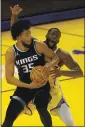  ?? EZRA SHAW — GETTY IMAGES ?? The Warriors’ Draymond Green draws an offensive foul on the Kings’ Marvin Bagley III.