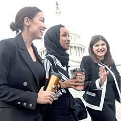  ??  ?? (From left) Ocasio-Cortez, Democrat of New York; US Representa­tive Ilhan Omar, Democrat of Minnesota; and US Representa­tive Haley Stevens, Democrat of Michigan, arrive for a photo opportunit­y with the female House Democratic members of the 116th Congress outside the US Capitol in Washington, DC. — AFP photo