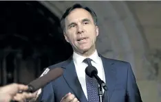  ?? JUSTIN TANG/THE CANADIAN PRESS ?? Finance Minister Bill Morneau announced last week he’ll donate to charity the difference in the value of his shares in Morneau Shepell between the date he was elected in October 2015 and the day they’re sold.