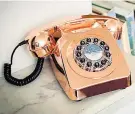  ??  ?? Bring a vintage vibe to home with this classic phone. Metallic phone, £79, Not On The High Street