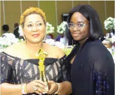  ?? ?? Nkechi- Ali Balogun and daughter, Ikeoluwa at the event