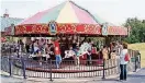  ?? [PHOTO PROVIDED] ?? Orr Family Farm guests ride the 1974 vintage carousel.