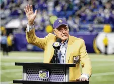  ?? JIM MONE / AP ?? Former Minnesota Vikings Hall
of Fame coach Bud Grant waves
a final goodbye
to the Metrodome
during ceremonies after a game against the Detroit Lions in 2013.