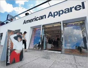  ?? Mel Melcon Los Angeles Times ?? AMERICAN APPAREL’S buyer had no interest in its 110 U.S. stores, including this one on Melrose.