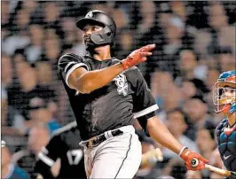  ?? CHRIS SWEDA/CHICAGO TRIBUNE ?? The Sox’s Eloy Jimenez hit a key 2-run homer against the Cubs in a June 18, 2019 game.