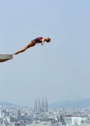  ??  ?? American diver Mary Ellen Clark during a pre-Games training session; she went on to win bronze for the 10-metre platform at the 1992 Games