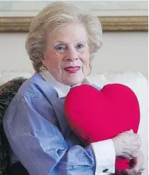  ?? P I E R R E O B E N D R AU F/ MO N T R E A L G A Z E T T E ?? Barbara Brock, a longtime auxiliary member at the Royal Victoria Hospital, with one of the pillows that, thanks to her efforts, are provided to cardiac surgery patients.