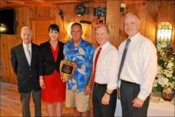  ?? SUBMITTED PHOTO ?? County law enforcemen­t officials gather to bid a fond farewell to retiring county detective Scott Bireley at a recent event at Kings Mills in Aston. From left are longtime CID Capt. John McKenna, District Attorney Katayoun Copeland, Birely, former D.A. and now Judge Jack Whelan, and CID Chief Joe Ryan.