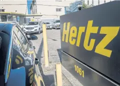  ?? BLOOMBERG ?? Signage for Hertz stands at a rental location in Berkeley, California on May 5.