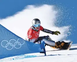  ?? [Getty Images/APA/AFP] ?? Ester Ledecká ist auf dem Board eine Macht – und auf den Skiern eine wahre Sensation.