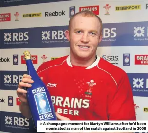  ??  ?? A champagne moment for Martyn Williams after he’d been nominated as man of the match against Scotland in 2008