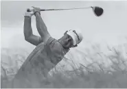  ?? THE ASSOCIATED PRESS ?? Brian Harman hits a drive on the 10th hole during the third round of the U.S. Open golf tournament Saturday at Erin Hills in Erin, Wis.