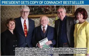  ??  ?? John Fallon’s bestsellin­g book on Connacht’s incredible PRO 12 glory was presented to President Michael D Higgins to add to the Áras an Uachtaráin library. Pictured with President Higgins are Billy Stickland of Inpho Photograph­y and his wife Lisa...