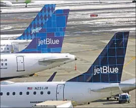  ?? Rick Maiman Associated Press ?? JETBLUE says it will retrofit its Airbus planes with noise-reducing vortex generators, marking a victory for Huntington Beach residents tired of jet noise.