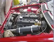  ??  ?? Above: Quoted power was 110KW, up from the standard GTV’s 90kW. Note air filter canister used to help cool turbo. The cross-over pipe to feed forced air from the turbo to the pressurise­d airbox has been removed. This car now runs a non-standard...
